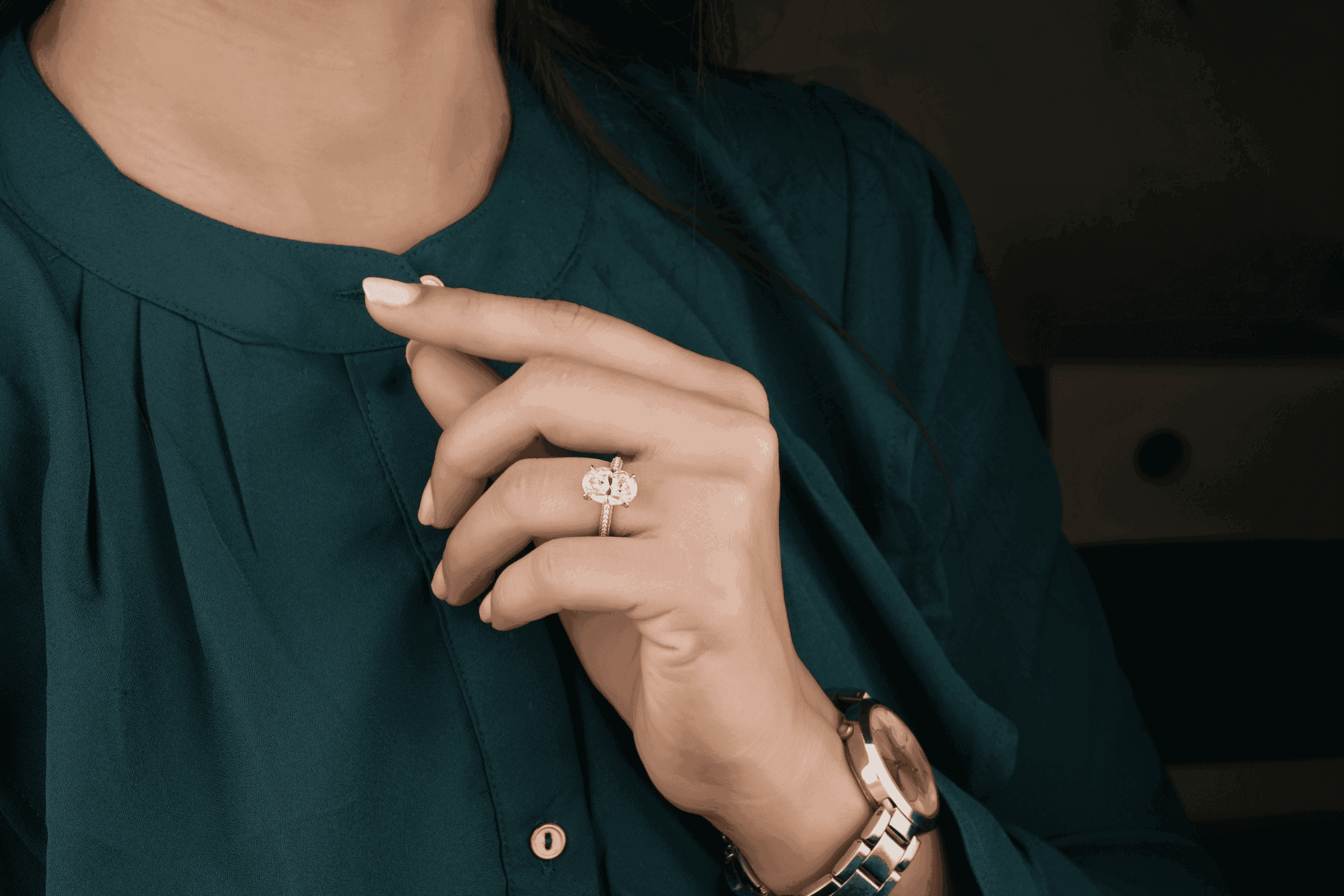 woman-wearing-a-diamondjools-engagement-ring.png
